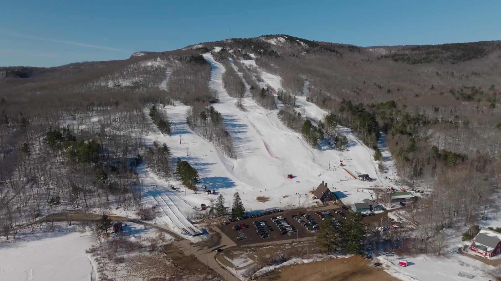 The Camden Snow Bowl ski area in Camden, Maine, with snow on the trails